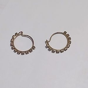 Gold colored earrings